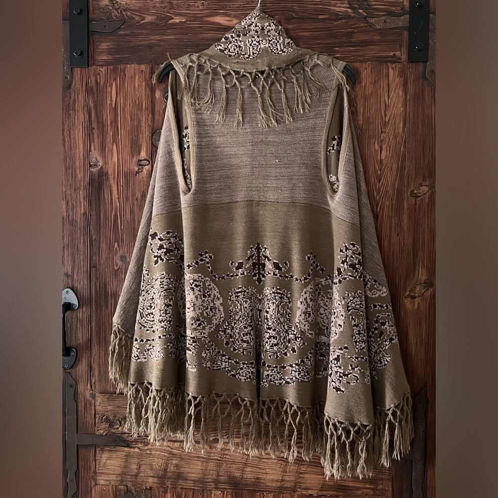 Shawl drapes in front with fringe